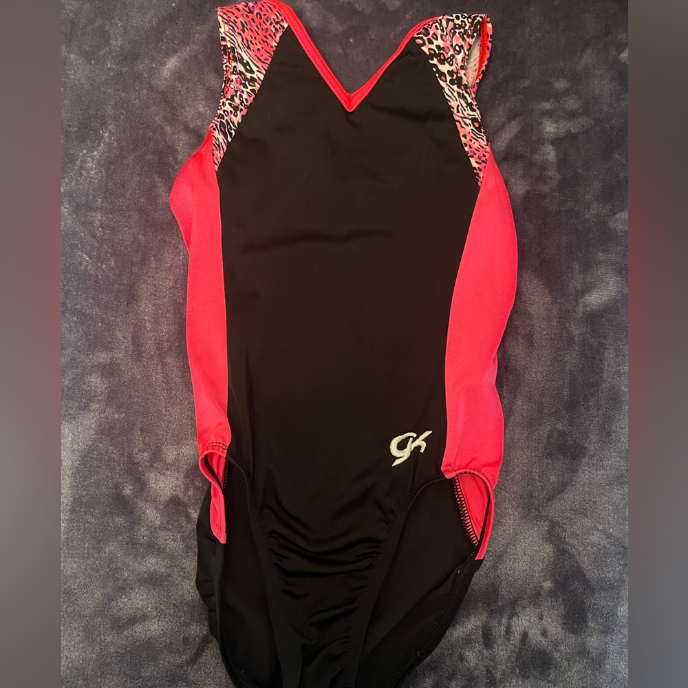 Children’s size large GK Leotard. Pink, black and white leopard print. GUC.